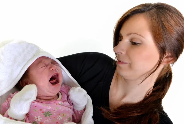 Foto de mãe feliz com bebê sobre branco — Fotografia de Stock