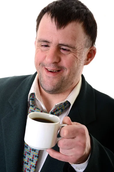 Down syndrome man with coffee — Stock Photo, Image
