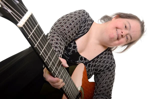 Woman with down syndrome with the guitar isolated on white background — Stock Photo, Image