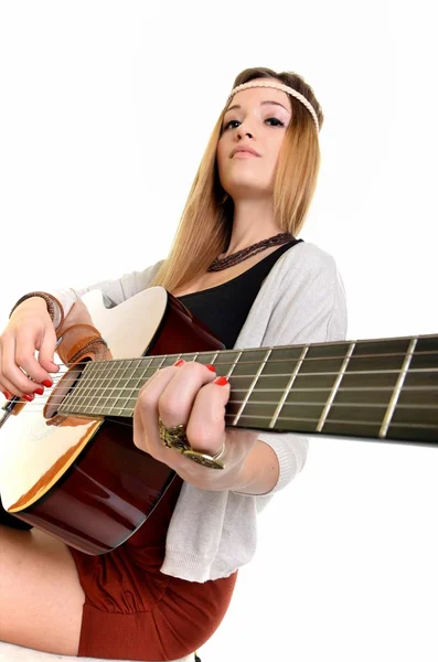 Hippie girl with the guitar isolated on white background — Stock Photo, Image