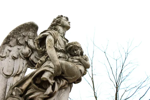 Sculpture d'un ange avec un enfant Images De Stock Libres De Droits