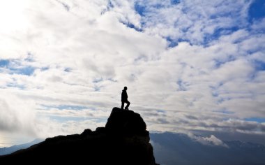 Woman on top of the mountain clipart