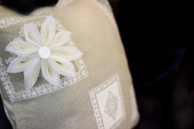 Decorative flower on the pillow. clipart