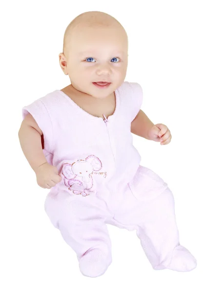 Маленький ребенок в платье на белом фоне — стоковое фото