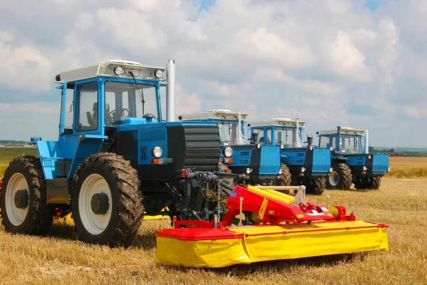stock image Group of powerful tractors on the field