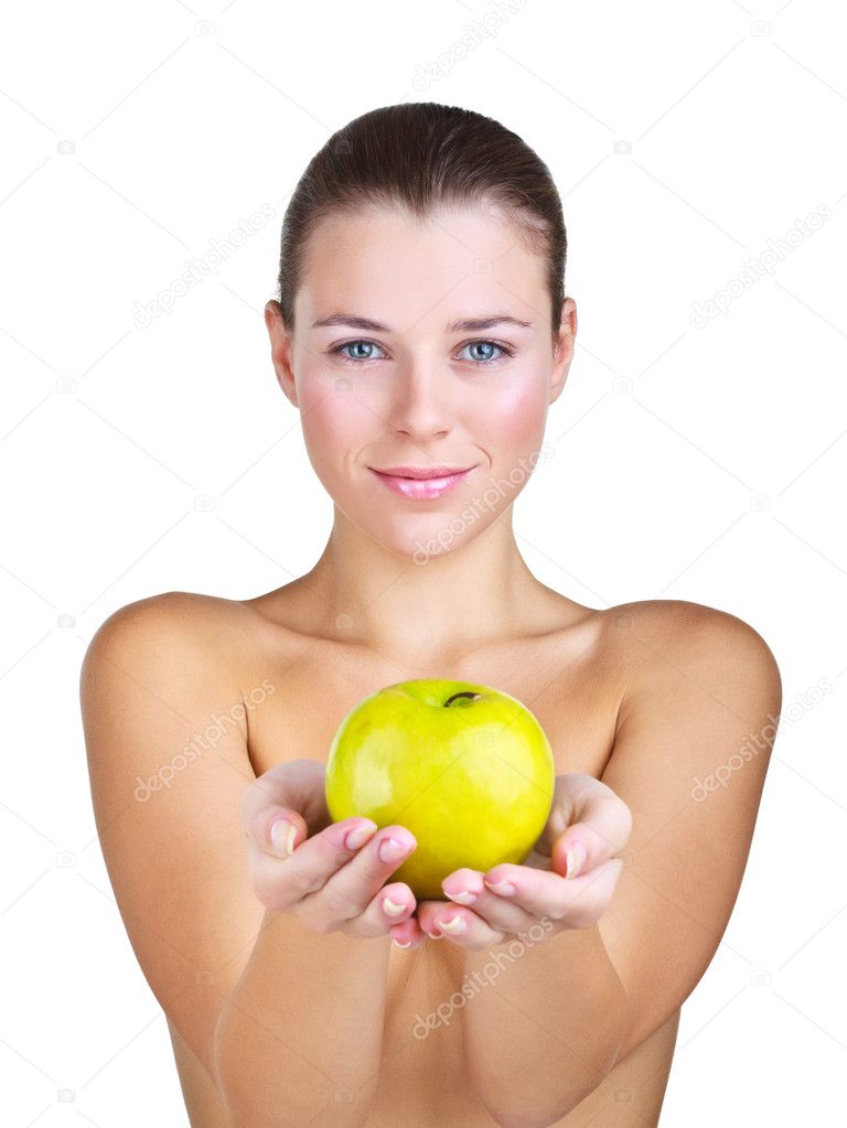 Woman holding apple in front of