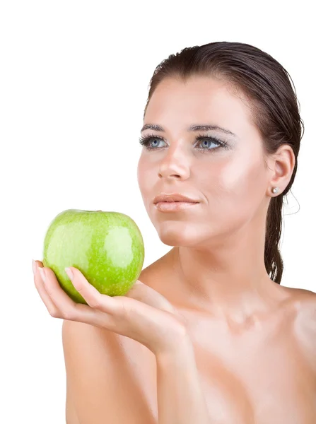 Beautiful girl holds in a hand green apple — Stock Photo, Image