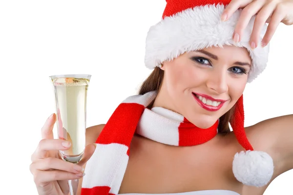 Een mooie vrouw gekleed in Kerstmis houdt een glas champagne — Stockfoto