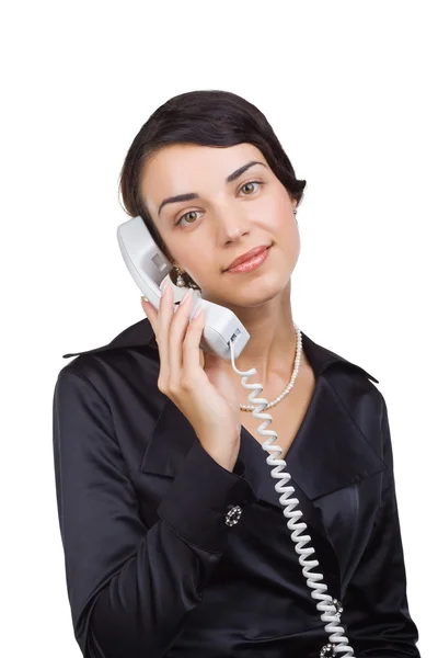 Geschäftsfrau mit Telefonhörer in der Hand — Stockfoto