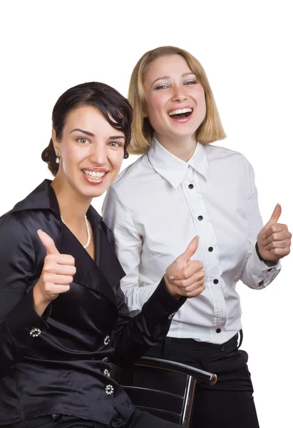 Dwie kobiety biznesu uśmiechający się wyświetlane kciuki — Zdjęcie stockowe
