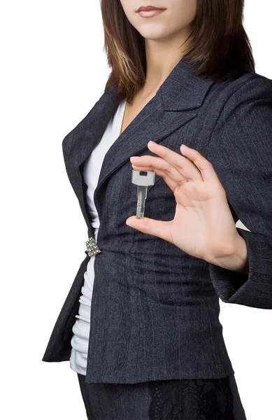 Mujer de negocios mostrando la clave — Foto de Stock