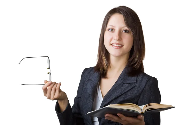 Biznes kobieta trzyma dziennik i okulary — Zdjęcie stockowe