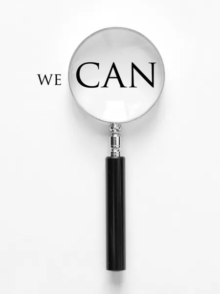 We can and magnifying glass — Stock Photo, Image