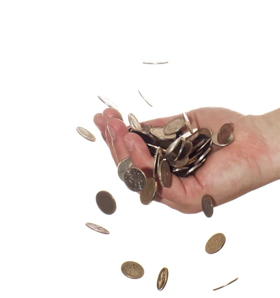 Coins falling into hand — Stock Photo, Image