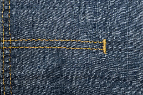 Background with blue jeans material