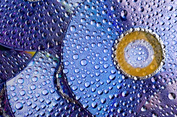 Disco e gotas de água — Fotografia de Stock