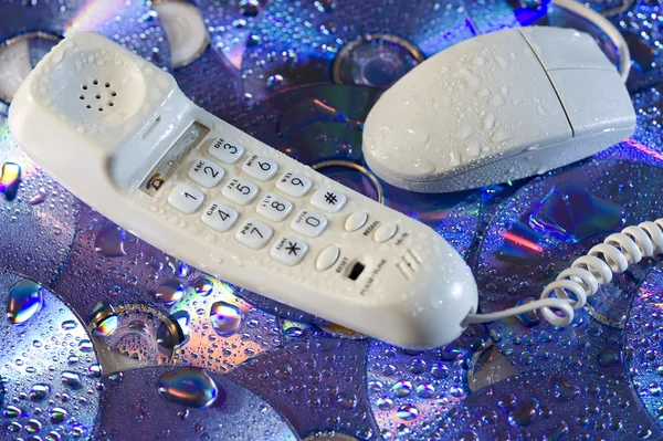 Telefoon en muis — Stockfoto