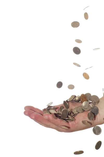 Coins falling into hand — Stock Photo, Image