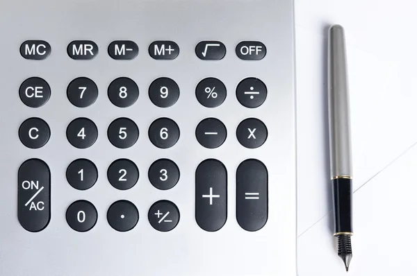 Miniräknare med penna — Stockfoto