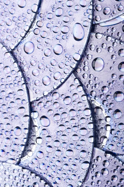 Disco y gotas de agua —  Fotos de Stock