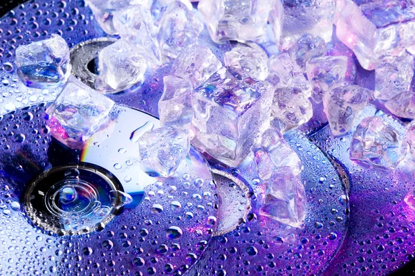 DVD disk and ice — Stockfoto