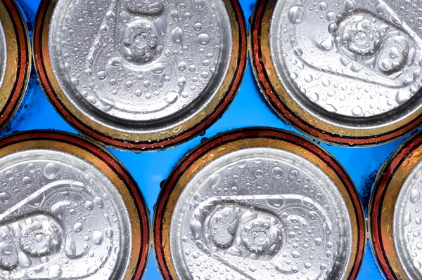 Shiny soda, beer cans viewed from above — Stock Photo, Image