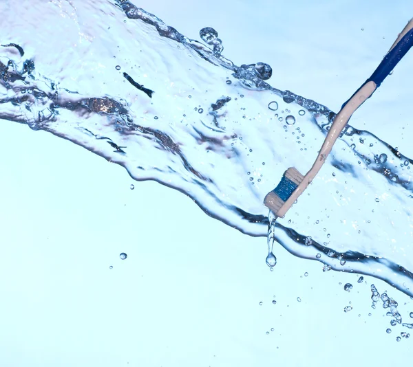 Toothbrush in fresh water — Stock Photo, Image
