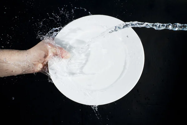 Розчавити воду на тарілці — стокове фото