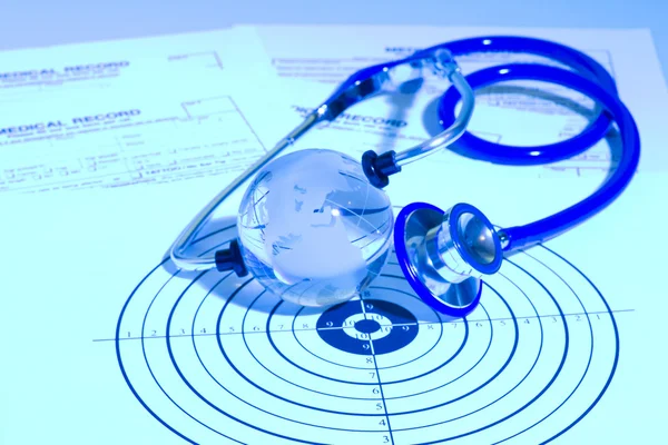 A prescription form and stethoscope on a doctor's desk — Stock Photo, Image