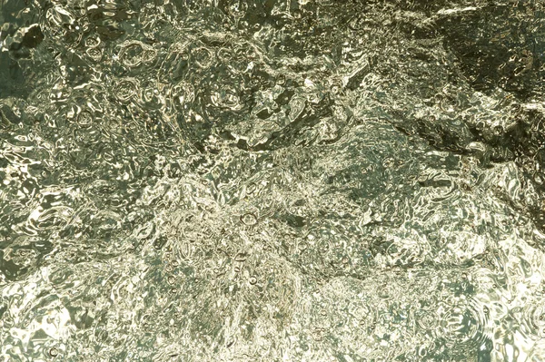 Surface d'eau dorée — Photo