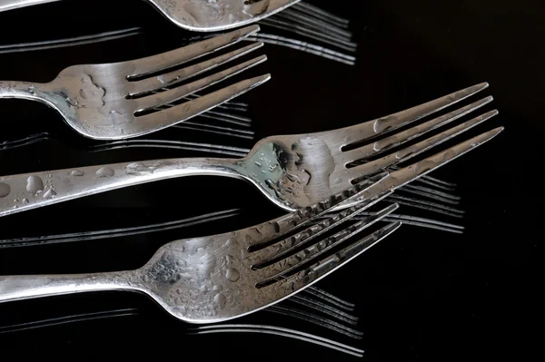 Fork on the black background — Stock Photo, Image