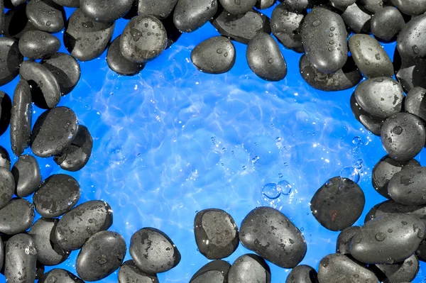 Çakıl taşları ve su — Stok fotoğraf