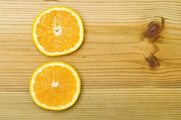 Orange on wood background — Stock Photo, Image