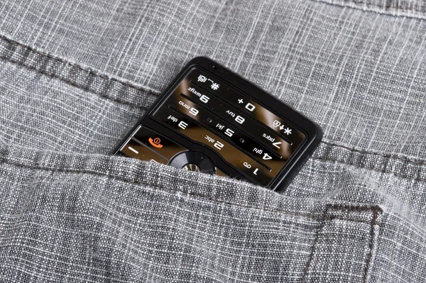 Teléfono en el bolsillo — Foto de Stock