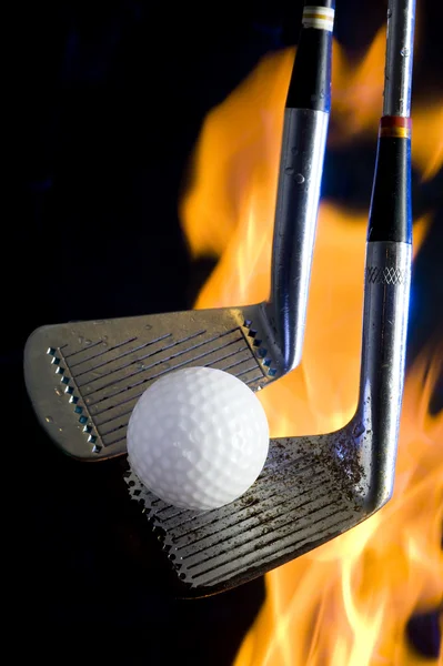 Golf topu ve yangın — Stok fotoğraf