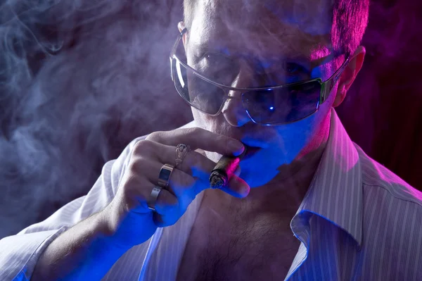 stock image Man smoking cigar