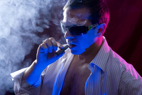 stock image Man smoking cigar