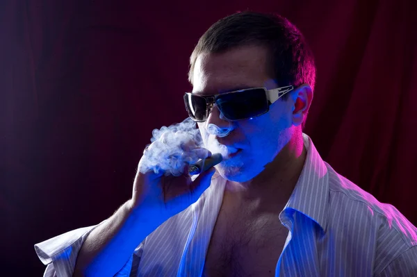 stock image Man smoking cigar