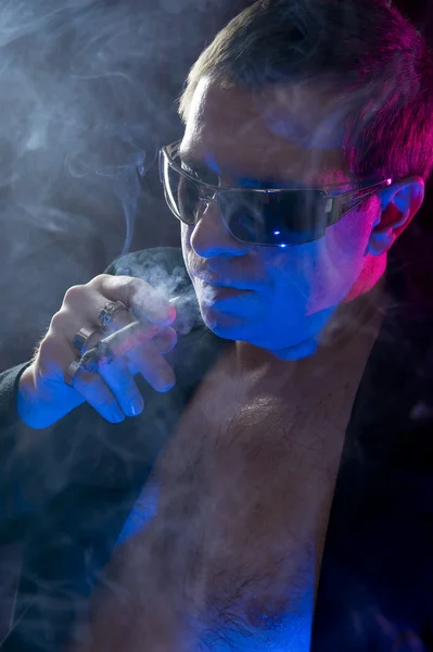 stock image Man smoking cigar