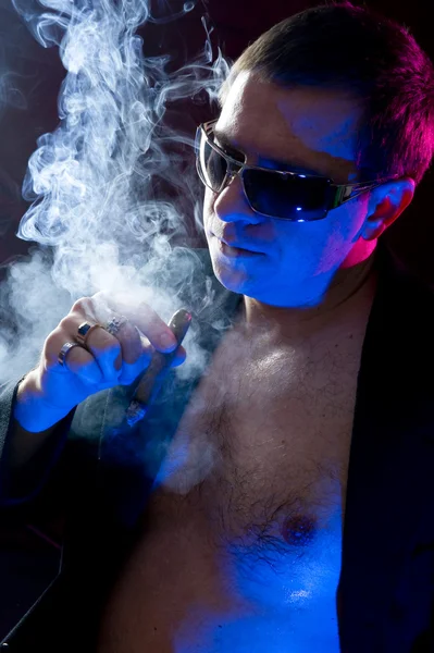 stock image Man smoking cigar