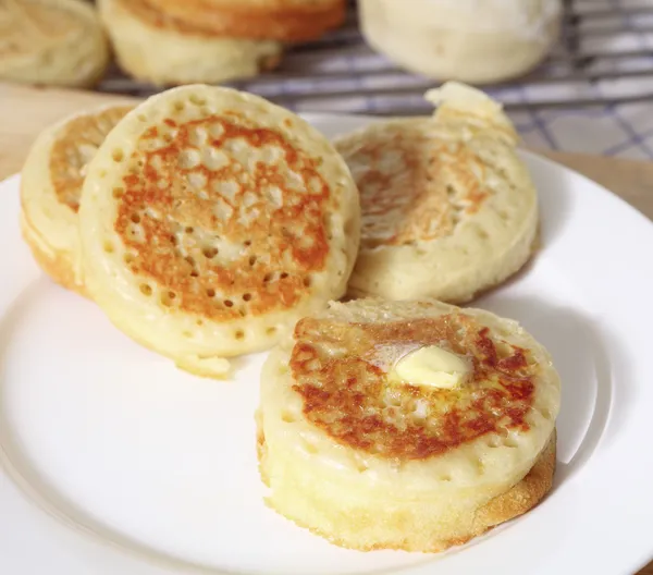 Buttered English crumpets — Stock Photo, Image