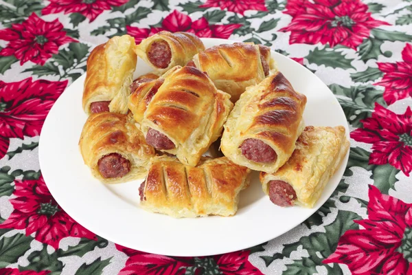 A plate of sausage rolls, traditional British Christmas food — Stock Photo, Image