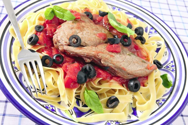 stock image Veal Mediterranean meal angled