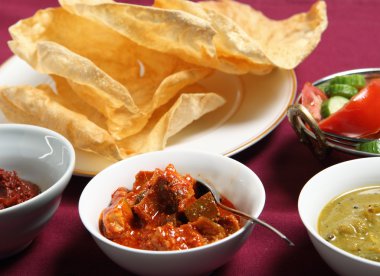 Chutney, papadums and salad clipart