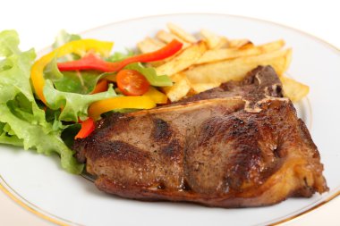 Pan-seared t-bone steak meal clipart