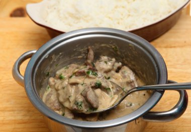 Beef stroganoff and rice horizontal clipart