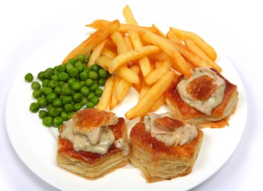 Vol-au-vents filled with turkey in a creamy herb sauce clipart