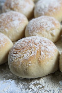 Freshly home-baked baps or scottish morning rolls clipart