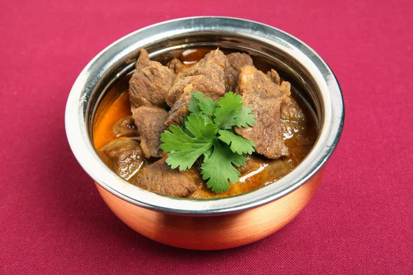 Beef korma in a stainless steel and copper — Stock Photo, Image