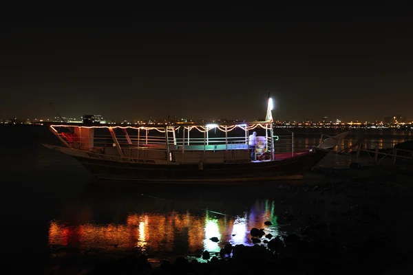 Dhow at night and reflection — Stock Photo, Image